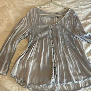 Long sleeve top. Baby blue. Very light fabric.